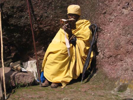 Monk studing Bible